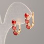 Kolczyki Xuping z czerwonymi kamieniami i białymi kryształami 17×5 mm Pozłacane 18K