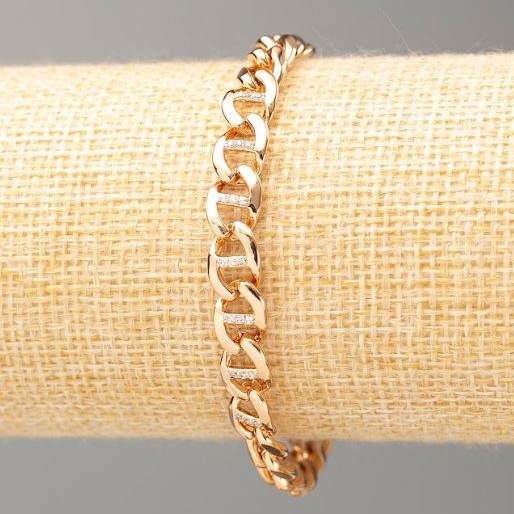 Bransoletka Xuping pozłacana 18K, długość 17 cm, grubość 7 mm ± z białymi kryształami
