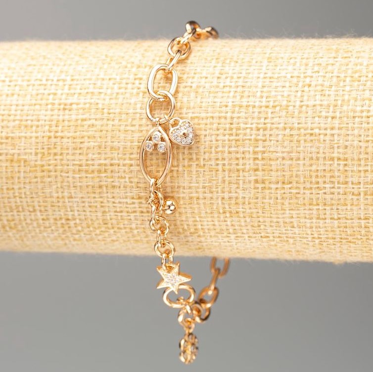 Bransoletka Xuping pozłacenie 18K, długość 19 cm, grubość ok. 5 mm, z białymi kryształkami