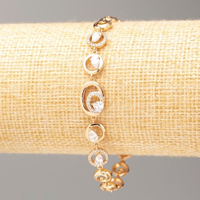 Bransoletka Xuping z pozłotą 18K, długość 19 cm, grubość 7–9 mm, z białymi kryształami