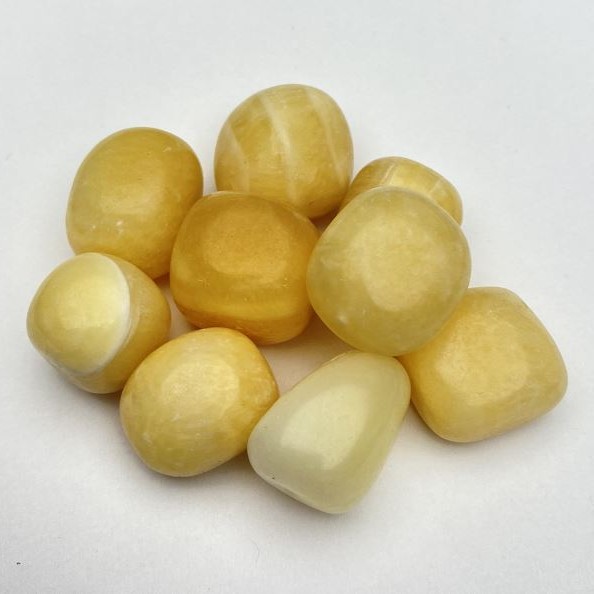 Kamień pamiątkowy naturalny Żółty onyks fasetowany 22x18 mm (+-)