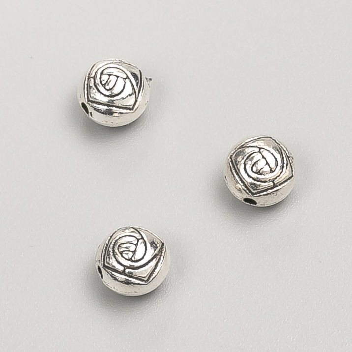 Koralik-wkładka, średnica 7×6 mm, opakowanie 20 g, 23 szt. ± kolor metalu 'srebro'
