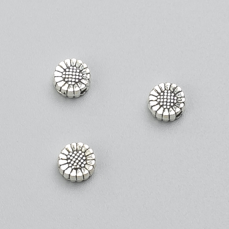 Okucia jubilerskie - koralik-wstawka Kwiat, średnica 6×3 mm, opakowanie 20 g, 66 szt. +- kolor metalu 'srebro'