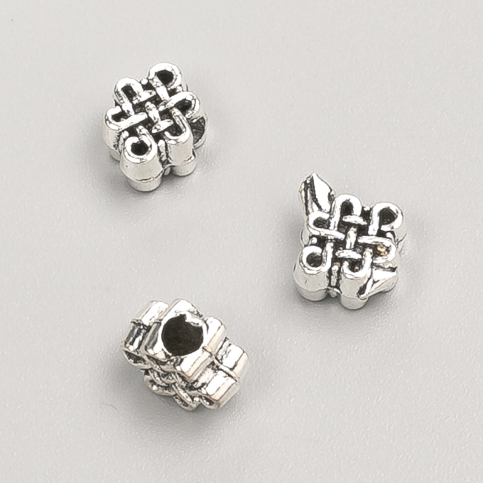Koralik-wkładka, wymiary 8×7×5 mm, opakowanie 20 g, 30 szt. ±, kolor metalu 'srebrny'