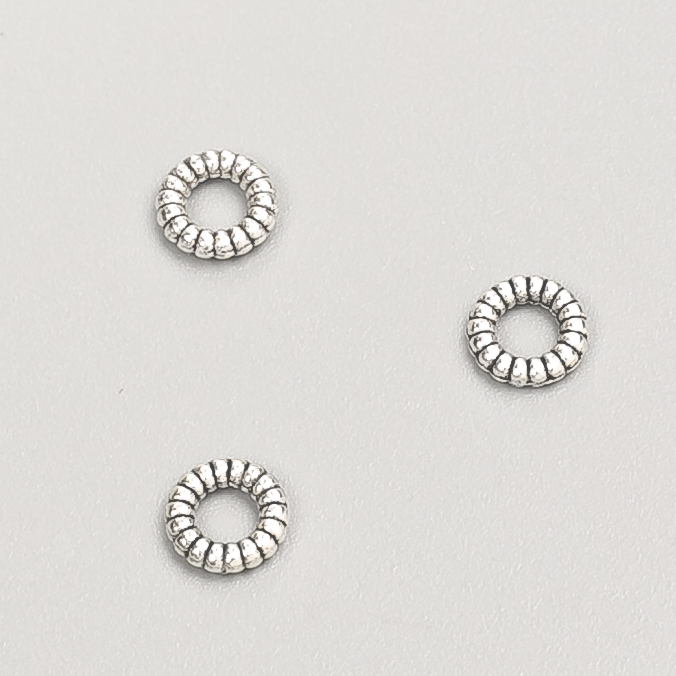 Okucia do biżuterii – koralik-wstawka, średnica 6×1 mm, opakowanie 20 g, 156 szt. ±, kolor metalu: srebro
