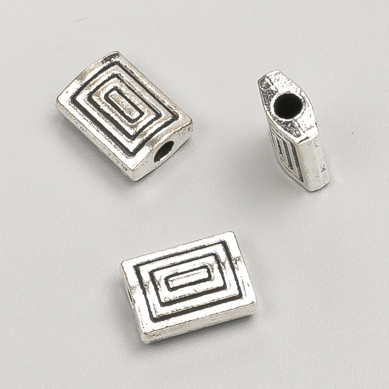 Koralik-wkładka, wymiary 12×8×4 mm, opakowanie 20 g, 12 szt. ±, kolor metalu: srebro