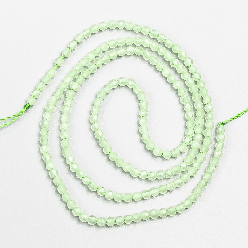 Koraliki drobne szpinelu (syntetyczny) jasnozielone fasetowane kuleczki, średnica 2 mm ±, na nitce, długość 37 cm