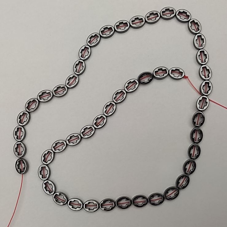 Koraliki hematitu w kształcie krzyża, średnica 6×8 mm, długość 39 cm na nitce