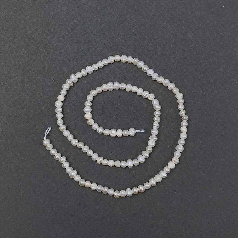 Perły rzeczne owalne na nitce, średnica 6×5 mm, długość 35 cm