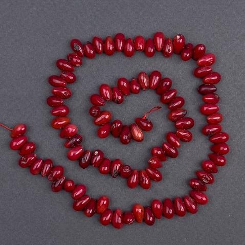 Koral naturalny – ziarenka, średnica 8×5 mm, długość około 40 cm, na nitce