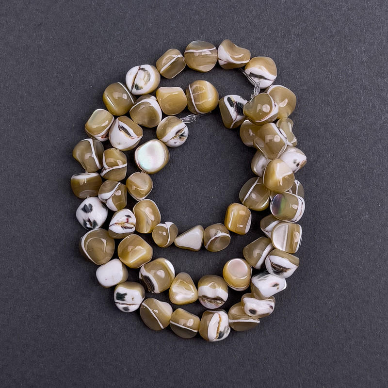 Koraliki z tonowanego perłowego beżu, fasetowane, średnica 8×6 mm, długość 41 cm, na żyłce