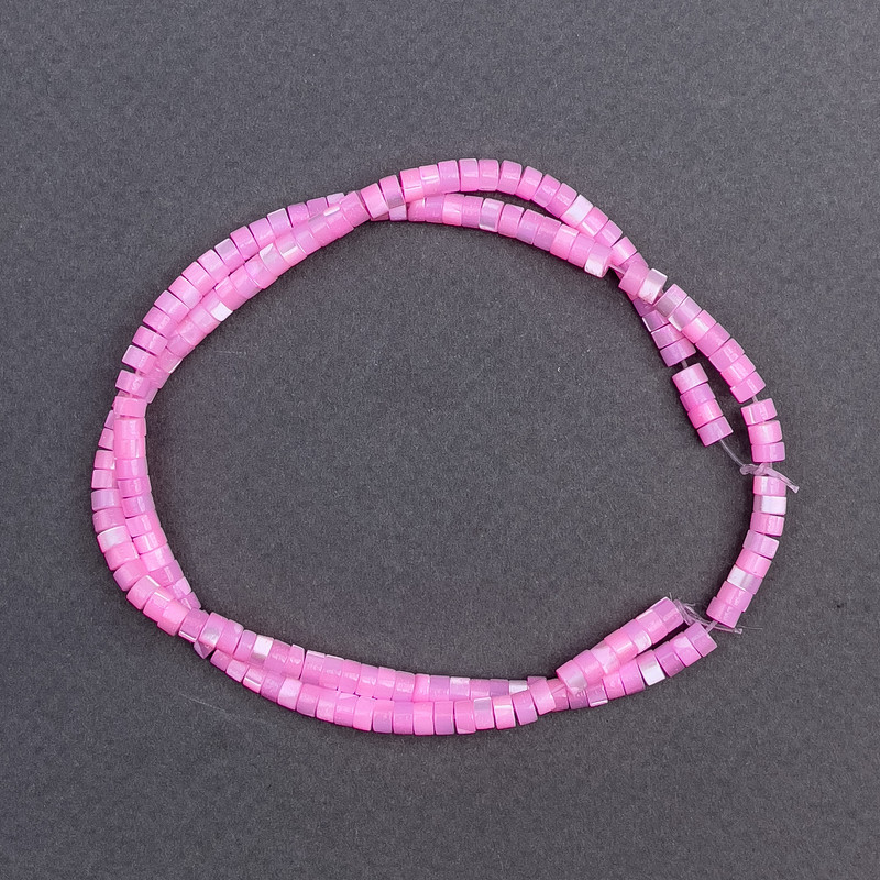 Koraliki tonowanego różowego perłowego odcienia w formie dysków, średnica 4×2 mm, długość około 40 cm, na żyłce