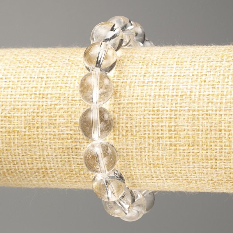 Bransoletka z górskiego kryształu, gładkie kuleczki, średnica 12 mm, długość 18 cm (rozciągliwa)