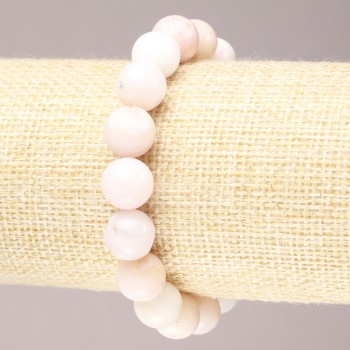 Bransoletka na gumce z naturalnego kamienia – różowy opal, gładka kula, średnica ok. 10 mm