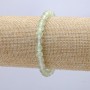 Bransoletka na gumce z prehnitu, gładka kulka, średnica 6 mm, długość 18 cm +