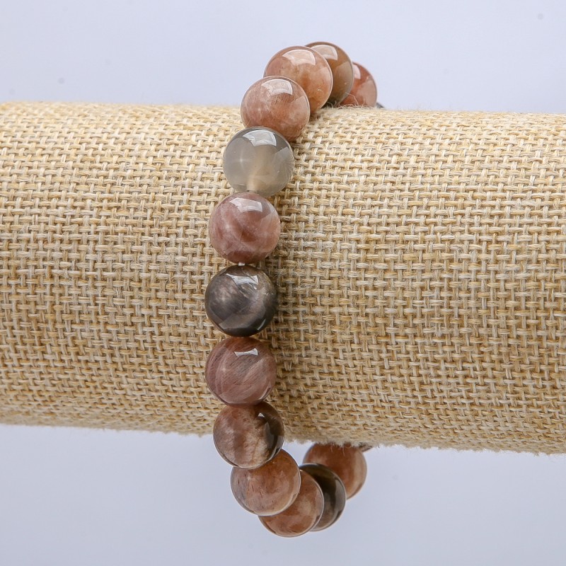 Bransoletka na gumce z naturalnego kamienia Selenit – gładka kuleczka, średnica 10 mm, obwód 18 cm