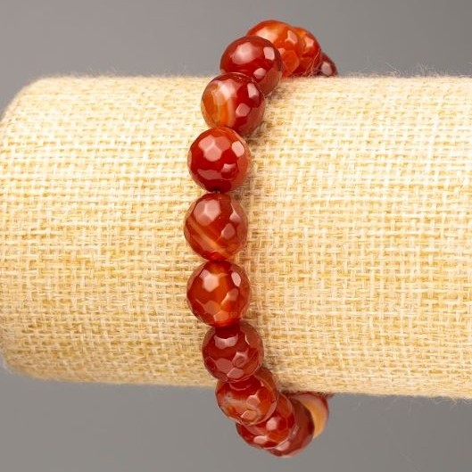 Bransoletka z karneolu, naturalnego kamienia, fasetowane kuleczki, średnica ok. 10 mm, długość 18 cm (rozciągliwa)