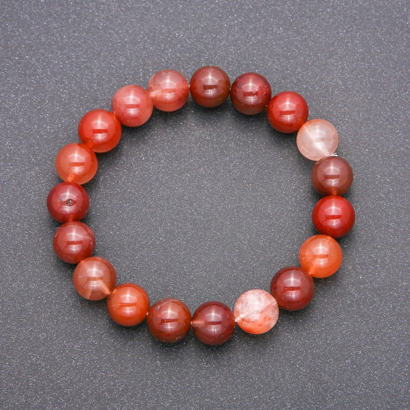 Bransoletka z naturalnego kamienia – kwarc rutylowy, asortyment na elastycznej gumce, gładkie kulki, średnica około 10 mm, długość 18 cm
