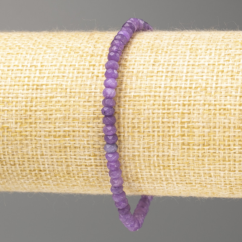 Bransoletka z tonowanego kwarcu (syntetyczny) ametyst lawendowy fasetowany rondel, średnica 4×3 mm, długość 18 cm (na gumce elastycznej)