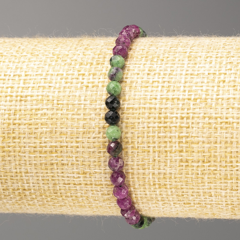 Bransoletka z naturalnego kamienia zoizytu — fasetowana kuleczka, średnica 4 mm, długość 18 cm (na elastycznej gumce)