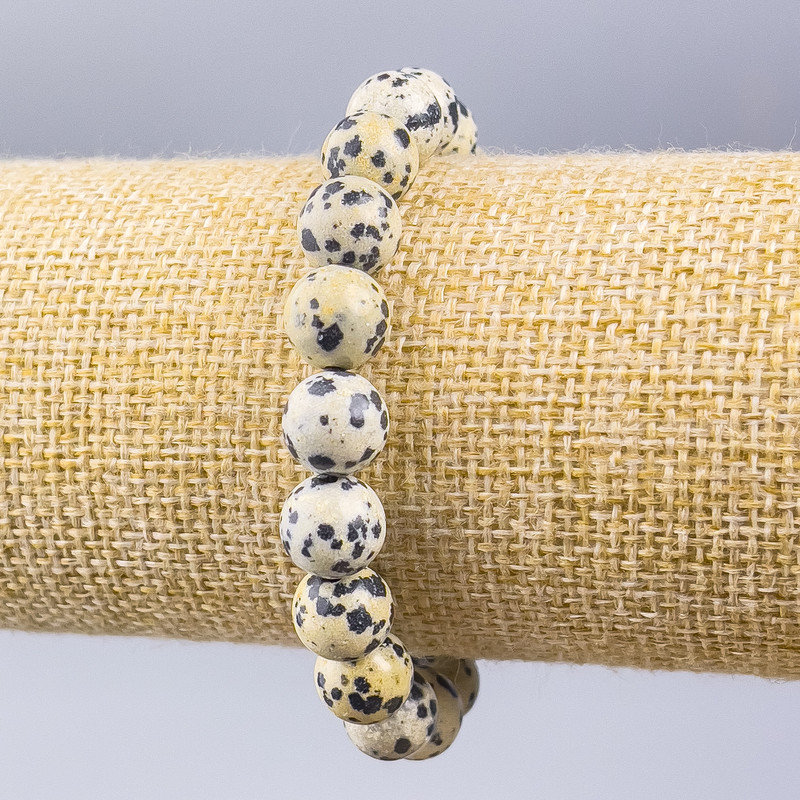 Bransoletka z jaspisu dalmatyńskiego (sztuczny akryl) gładka kulka, średnica 10 mm ±, długość 18 cm (elastyczna)