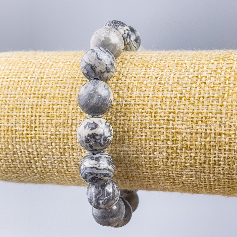 Bransoletka z szarego jaspisu oceanicznego (sztuczny akryl) gładka kulka o średnicy 12 mm, długość 18 cm (elastyczny)