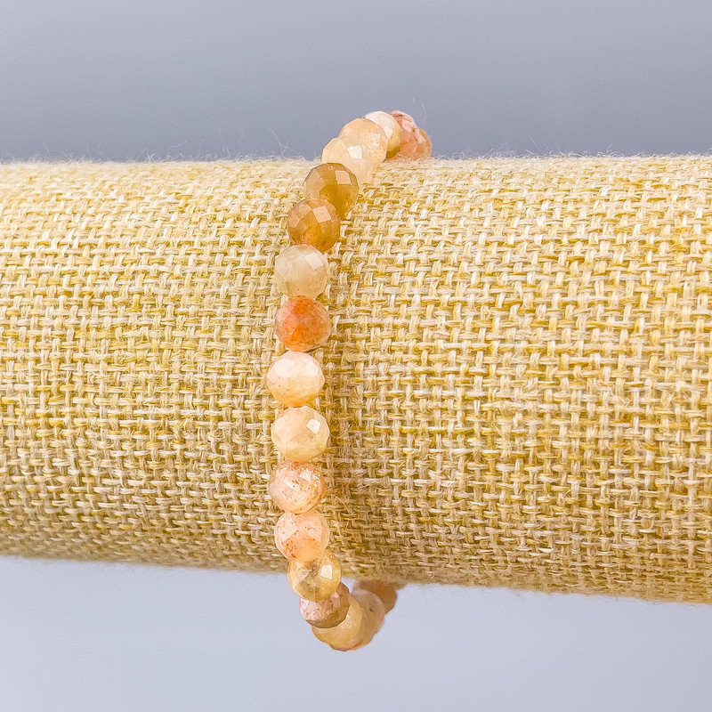 Bransoletka z selenitu, fasetowane kulki 6 mm, długość 18 cm (rozciągana)