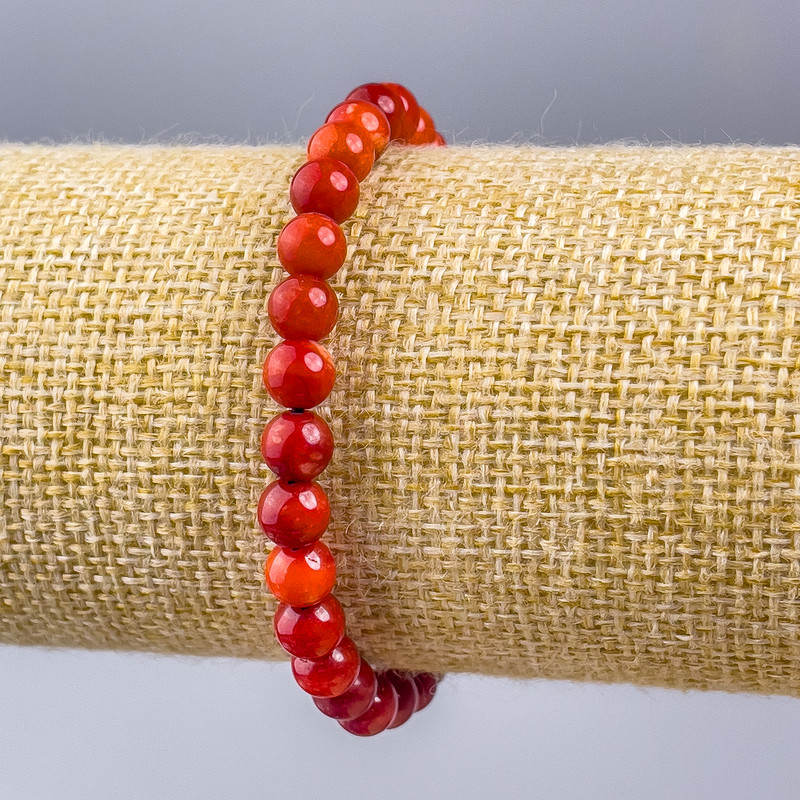 Bransoletka z sztucznego koralu (gładkie kulki), średnica 6 mm, długość 18 cm (na elastycznej gumce)