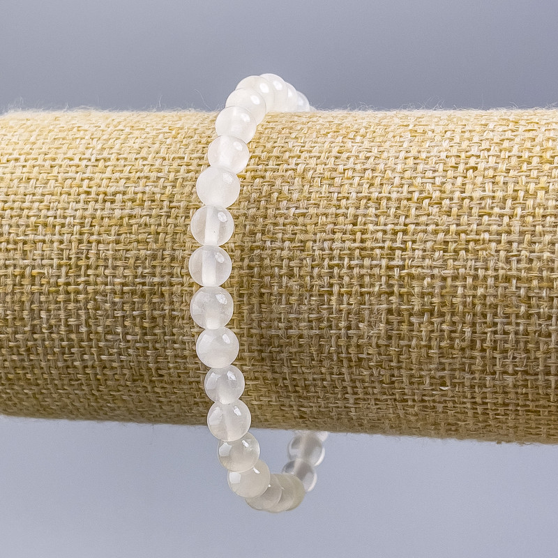 Bransoletka z białomorytu, naturalny kamień, gładkie kule o średnicy ok. 6 mm, długość 18 cm (rozciągana)
