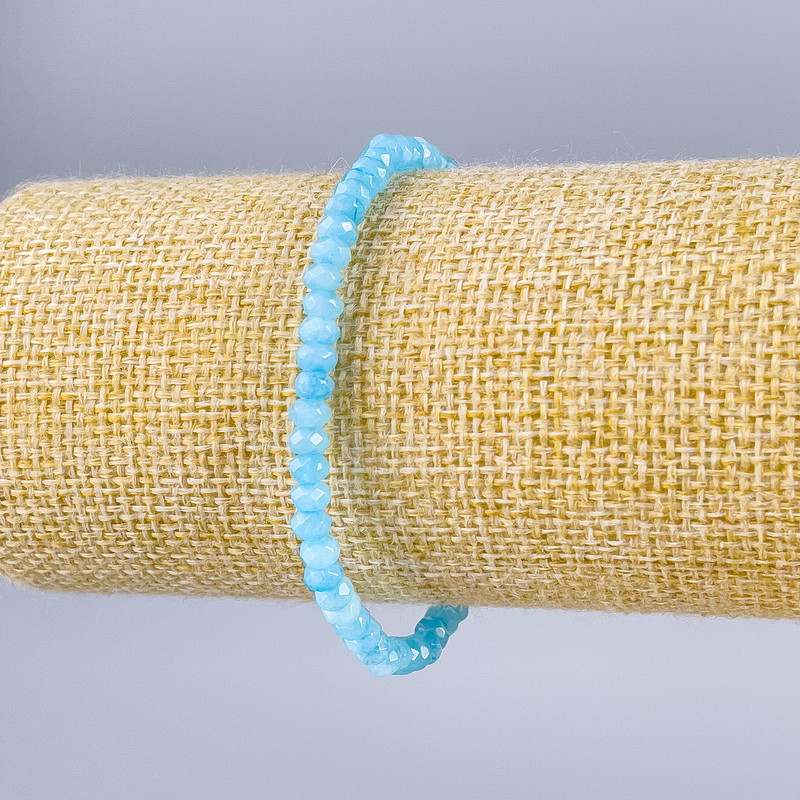 Bransoletka z sztucznej akwamaryny, fasetowane rondelki, średnica 4×3 mm, długość 18 cm (rozciągliwa)