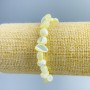 Bransoletka z masy perłowej o jasnożółtym odcieniu, fasetowane kulki, średnica 8×6 mm, długość 18 cm (rozciągana)