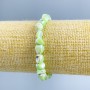 Bransoletka z masy perłowej w jasnozielonym odcieniu z fasetowanymi koralikami, średnica 8×6 mm, długość 18 cm (rozciągana)