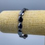 Bransoletka z hematytu w kształcie owalu, wymiary około 14×10×5 mm, długość 18 cm (elastyczna)