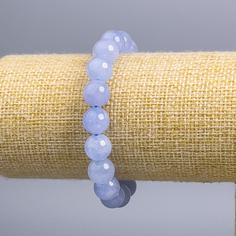 Bransoletka z akwamarynu — gładkie kuleczki o średnicy 10 mm, długość 18 cm (rozciągliwa)