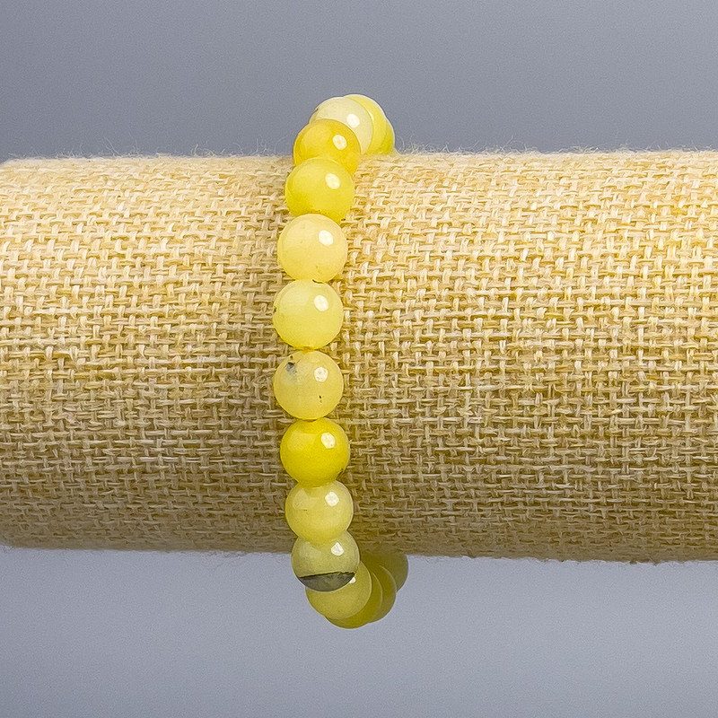 Bransoletka z tonowanego kwarcu włosowatego — gładka kulka, średnica 8 mm, długość 18 cm (na elastycznej gumce)