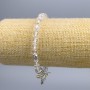 Bransoletka z górskiego kryształu — gładkie kulki, średnica 6 mm ±, ze srebrzystymi wstawkami, długość 18 cm (elastyczna)