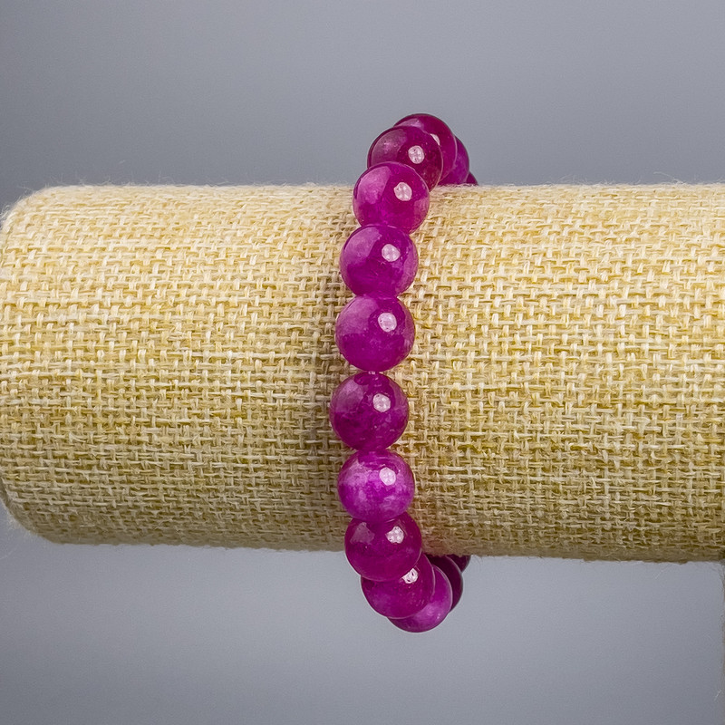 Bransoletka „Turmalin” (sztuczny) malinowy, gładka kulka, o średnicy ok. 10 mm, długość 18 cm, na elastycznej gumce