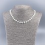 Naszyjnik z naturalnej białej masy perłowej w formie krzyżyków, średnica 8×8×3 mm, długość około 50 cm