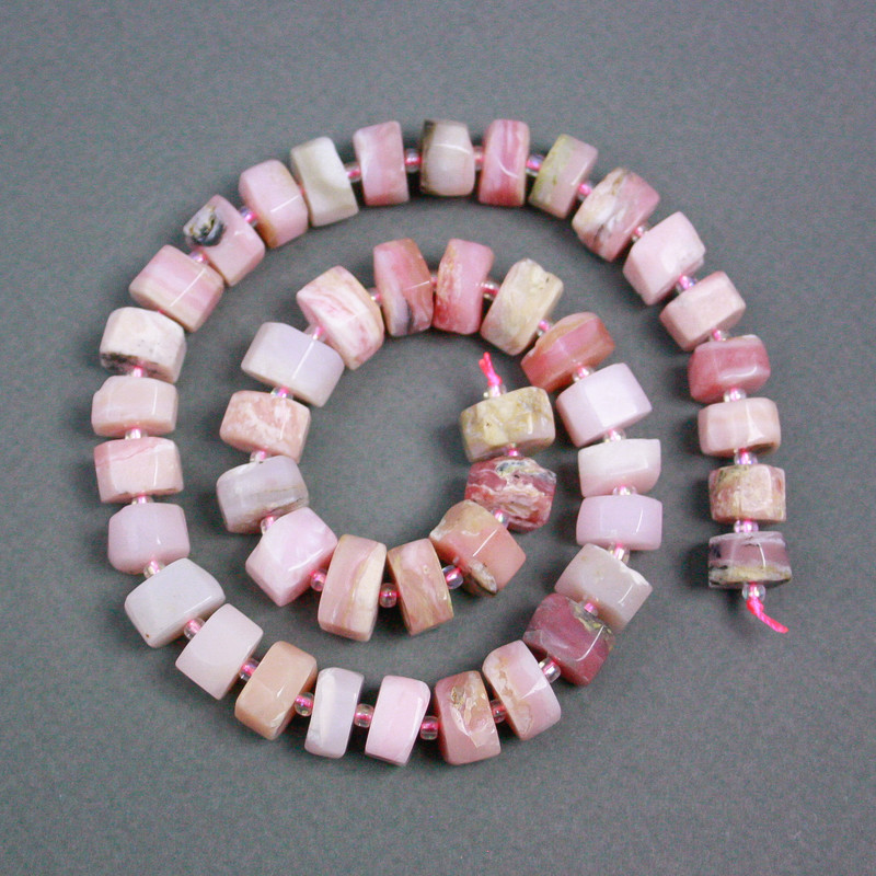 Koraliki na nitce różowy opal rondel, średnica 12x7 mm +/- z koralikami, średnica 2 mm +/-, długość 39 cm