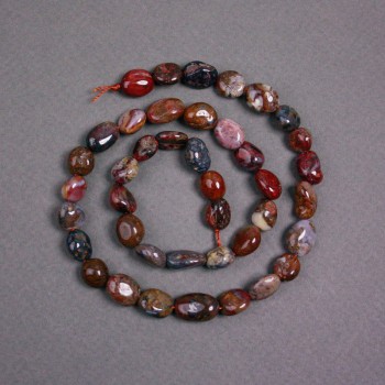 Koraliki pietersytu na nitce naturalne 7×10 mm fasetowane, długość ok. 38 cm