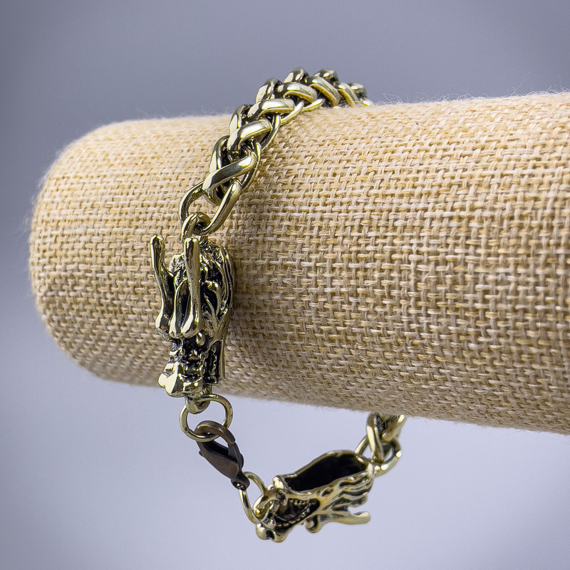 Bransoletka łańcuszkowa «Smok» z metalem o złocistym odcieniu, 10,5×30 mm, grubość 8 mm, długość 21 cm +