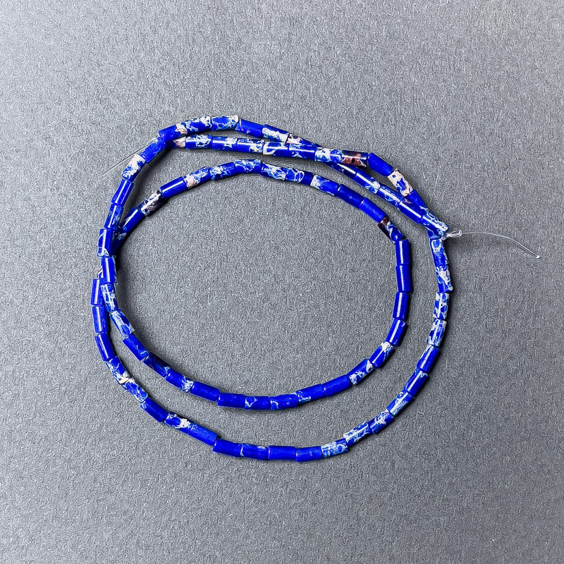 Koraliki z variscytu niebieskie (fasetowane), średnica 2×4 mm ±, długość około 38 cm ± na nitce