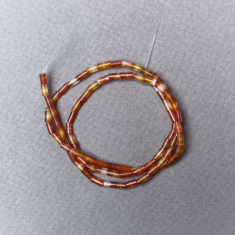 Koraliki karneol naturalny kamień, fasetowane, średnica 2×5 mm ±, długość 38 cm ±, na nitce