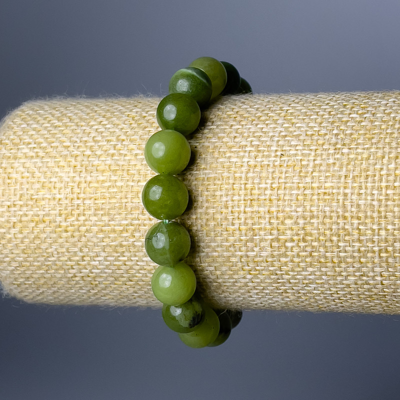 Bransoletka z jadeitu kanadyjskiego, naturalny kamień, gładka kula, średnica 10 mm, długość 18 cm (elastyczna)