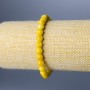 Bransoletka z żółtego jadeitu — gładka kuleczka, średnica 6,5 mm, długość 18 cm (rozciągana)