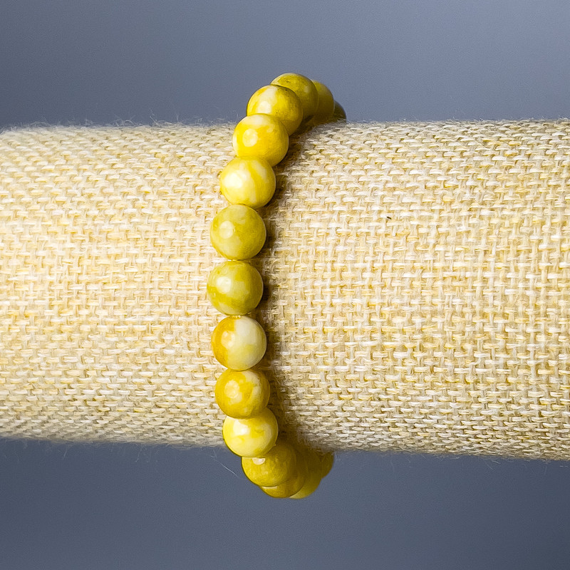 Bransoletka z żółtego jadeitu, gładkie kulki, średnica 8,5 mm, długość 18 cm (rozciągliwa)