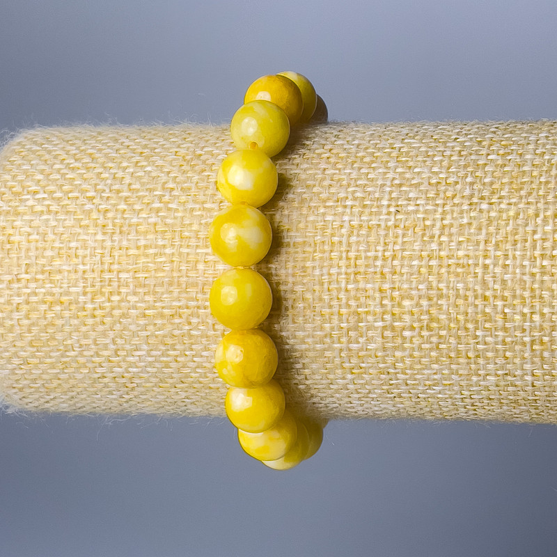 Bransoletka z żółtego jadeitu, gładkie kule o średnicy około 10 mm, długość 18 cm (elastyczna)