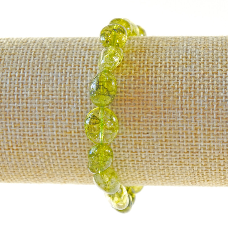 Bransoletka z kryształu oliwkowego, tonowana pod oliwin, fasetowane koraliki o wymiarach 8×11 mm, długość 18 cm (elastyczna)
