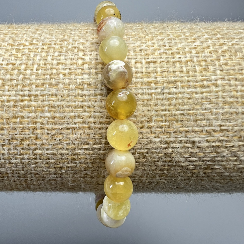 Bransoletka z żółtego opalu – naturalny kamień, gładkie kule, średnica 6,5 mm, długość 18 cm (rozciągliwa)