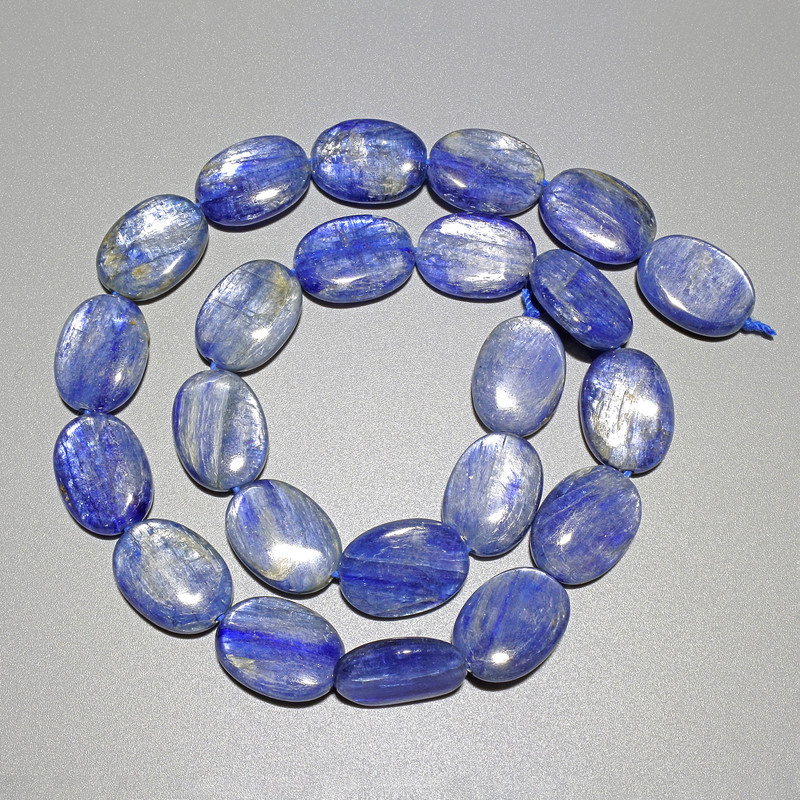 Koraliki z kianitu, naturalny kamień, owalne, 12×16 mm, długość 40 cm, na nitce